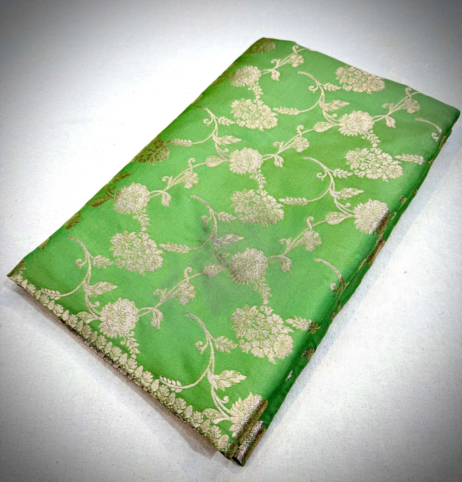 Elegant Green Katan Silk Saree with Floral Vine Weaving